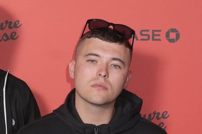 Star of rap group Kneecap charged with terrorism offence over Hezbollah flag