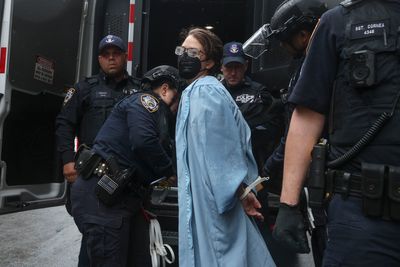 AP PHOTOS: Columbia University president notes Mahmoud Khalil's absence at graduation
