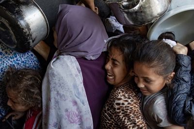 Israeli strikes kill 51 in Gaza as aid groups collect limited supplies