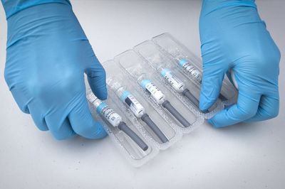 Vaccines helped avert hospital flu crisis, figures suggest