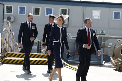 Kate names Royal Navy warship by smashing bottle of whisky against hull