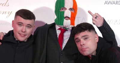 Rap trio Kneecap issue statement as member faces terror charge