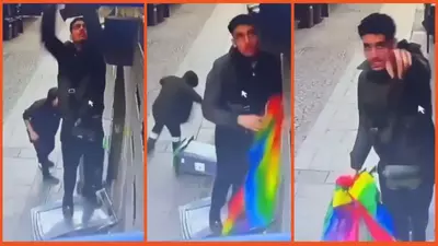 ‘Quite the clown show’: Intolerant buffoons tear down pride flags outside a gay bar in Paris but don’t notice the camera pointed at their faces