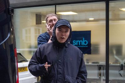 Kneecap star arrives at show with tape over mouth a day after terror charge