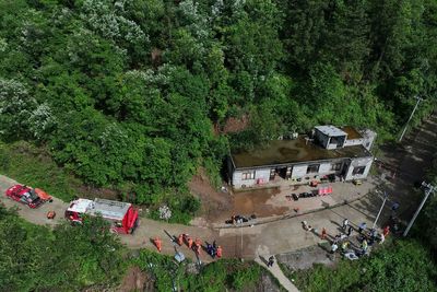4 dead and 17 trapped in landslides in southwestern China