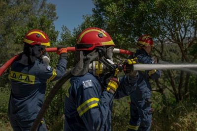 Blaze-hit Athens Suburb Trains To Tackle New Fire Season