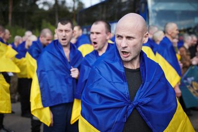 Hundreds of Ukrainian and Russian soldiers and civilians released in biggest prisoner swap of war