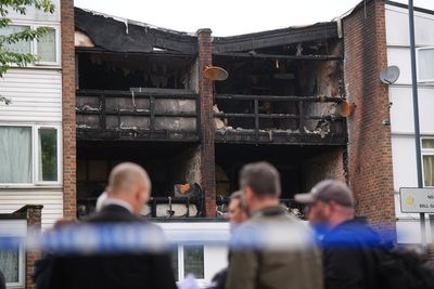 House fire horror: Mother and three children killed as blaze rips through north London home and man arrested