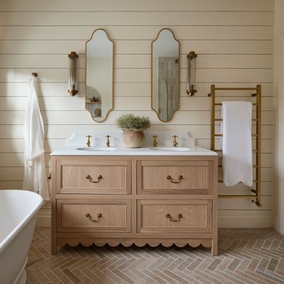 Love the scallop trend? This luxe bathroom was transformed from a dated 1960s suite with perfectly placed curves