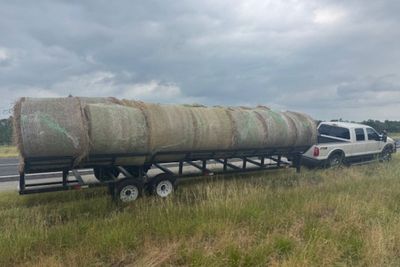 Police stop innocent-looking trailer – only to uncover smuggling operation in hollowed-out bales of hay