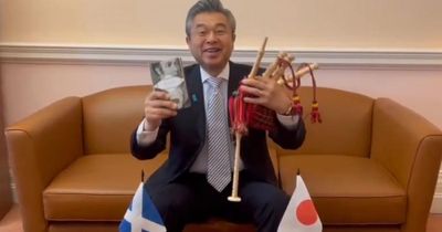 Japanese ambassador poses with bagpipes as he announces Scotland visit