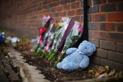 Tributes left after mother and three children die in north-west London house fire