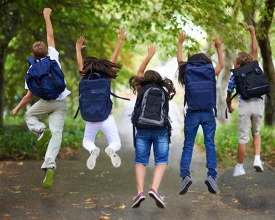 Readers reply: Should schools take a long summer break – or does it harm children’s learning?