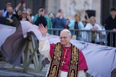 Pope Leo XIV declares 'I am Roman!' as he completes formalities to become bishop of Rome