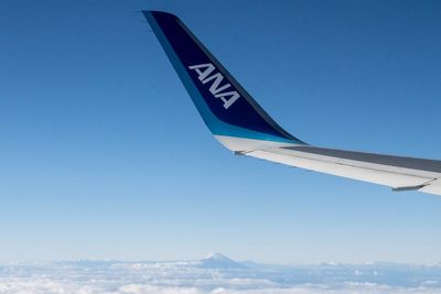 Plane forced to land in Seattle after passenger tries to open exit door mid-flight, police say