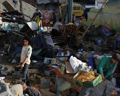 Israeli attack on school used as shelter in Gaza kills dozens, say local health officials – as it happened