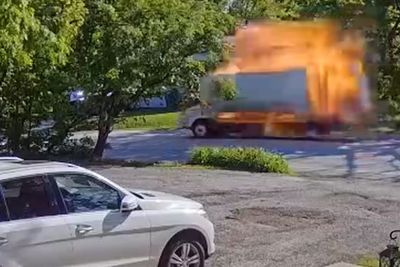 Moment truck explodes while driving through residential neighbourhood