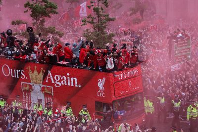 Liverpool: Tom Werner promises 'busy summer' as thousands attend trophy parade