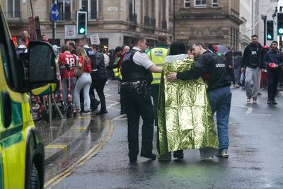 Man arrested after car ploughs into crowd at Liverpool victory parade