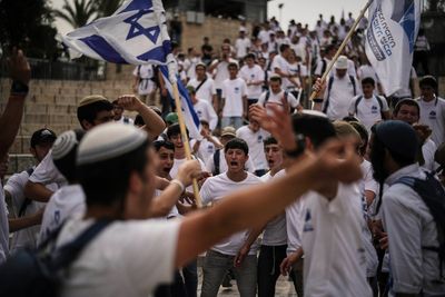 AP PHOTOS: Israeli nationalists march through Jerusalem
