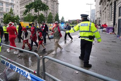 Man arrested after car ploughs through crowd at Liverpool’s Premier League parade