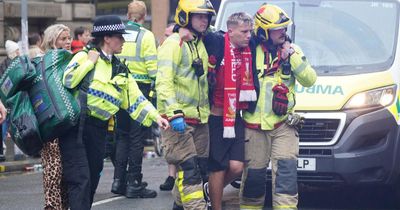 Man detained after car collides with pedestrians at Premier League parade