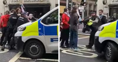 Stand-off breaks out between pro-trans activists and police