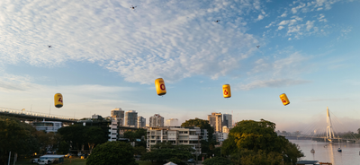 No, You’re Not Hallucinating, Those Were Giant XXXX Cans Over Brisbane River