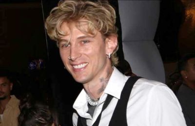 Machine Gun Kelly leaves American Music Awards early because baby daughter has a 'fever'