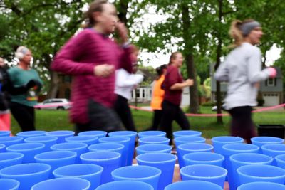 This runner was bothered by blizzard of disposable cups at races. She invented something better