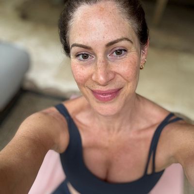 I Tried Doing Pilates Spine Twists Every Day for a Week - And It Loosened Years of Back Stiffness and Tension