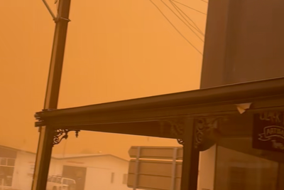 Hazardous dust storm turns sky eerie orange as residents urged to ‘stay inside’