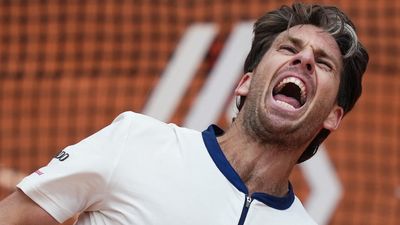 Norrie rediscovers his mojo to beat Medvedev in five-set thriller at French Open