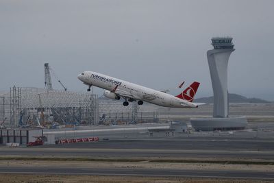 Turkey will fine airline passengers who unbuckle before the plane stops