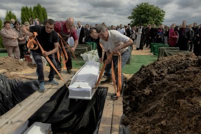 Ukrainian Town Mourns Three Siblings Killed In Russian Strike