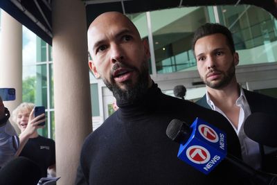 Tate brothers 'will return to UK' to face rape charges, lawyer says