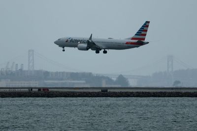 Shirtless American Airlines passenger tackles, pins crew member as flight to Chicago is thrown off course