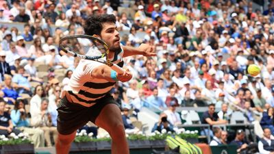 Alcaraz overcomes second set blip to advance to third round at French Open