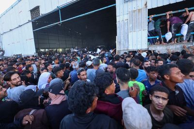 Four Palestinians killed as starving Gazans storm UN warehouse amid spiralling hunger crisis