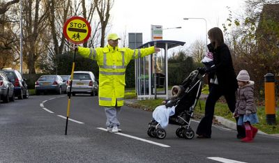 London council under fire as school crossing 'lollipop' patrols are axed