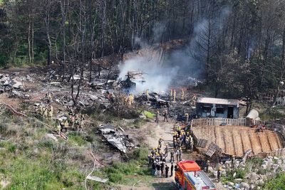 All four on board killed after South Korea navy plane crashes into mountains near base