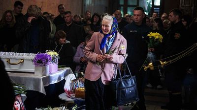Three young siblings laid to rest after deadly missile strike