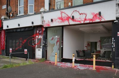 Police launch hunt after thugs smash windows and throw paint on Jewish-owned London business