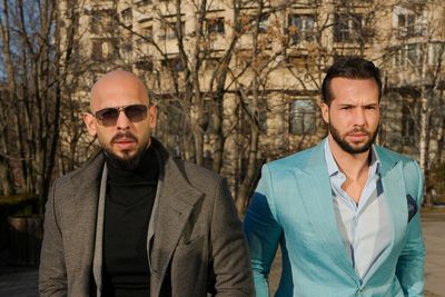 Lawyer says Tate brothers will return to UK to face rape and trafficking charges