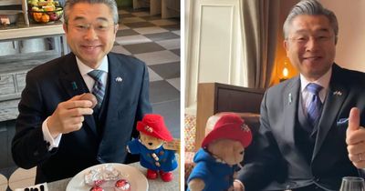 Japanese ambassador pictured eating Haggis and teacakes during Scotland visit