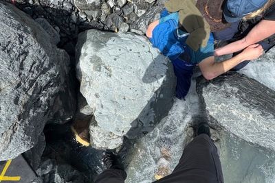 Alaska man unscathed after being pinned for three hours by 700-pound boulder in glacier creek