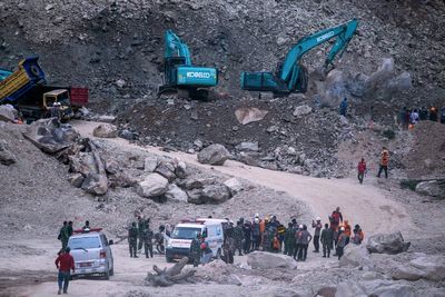 Officials say at least 2 people are dead and 8 are missing after stone quarry collapse in Indonesia