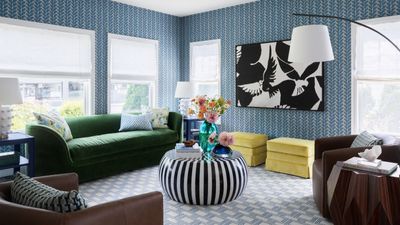 This 1920s Colonial home was stripped of all its original features – this designer brought it back to life with bold colors, clashing patterns, and funky furniture