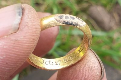 Detectorist discovers lost 18th-century ring ‘gleaming in sunshine’ on Norfolk walk