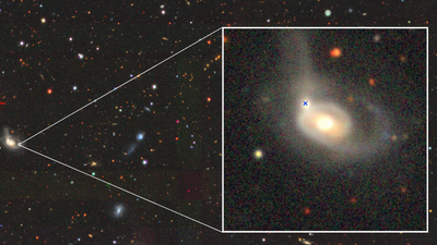 Astronomers discover black hole ripping a star apart inside a galactic collision. 'It is a peculiar event'